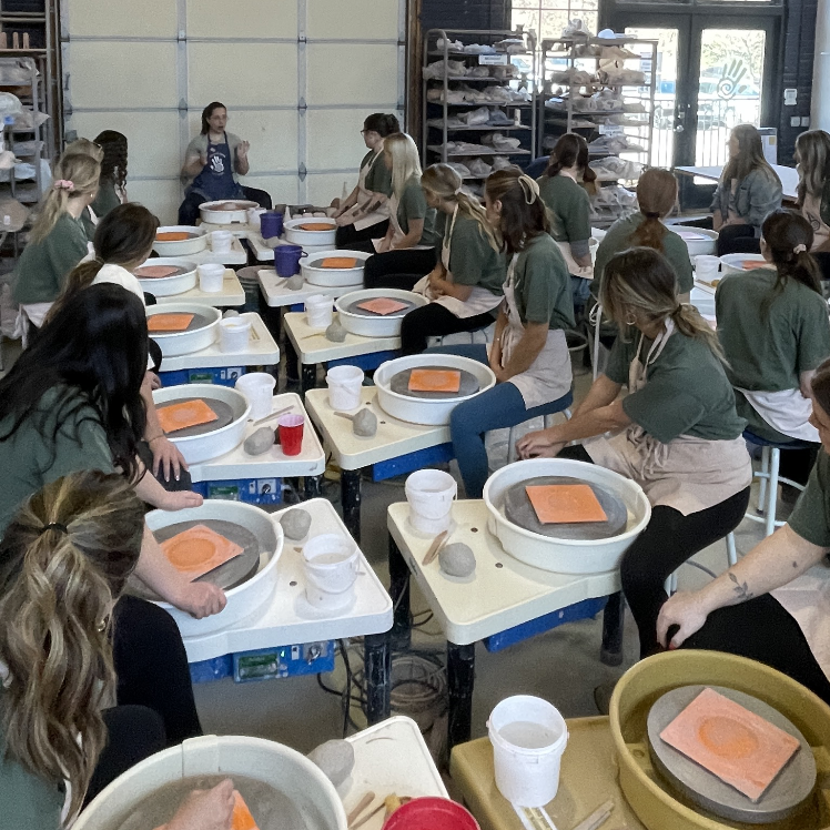 People building things with clay